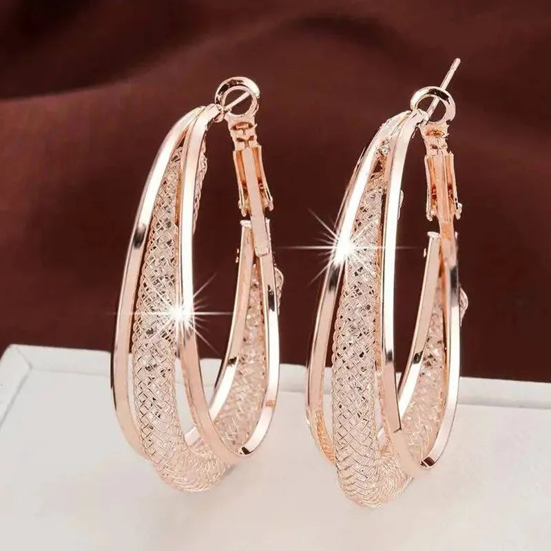 Earrings: Gold & Silver Twisted Hoop Earrings with Crystals