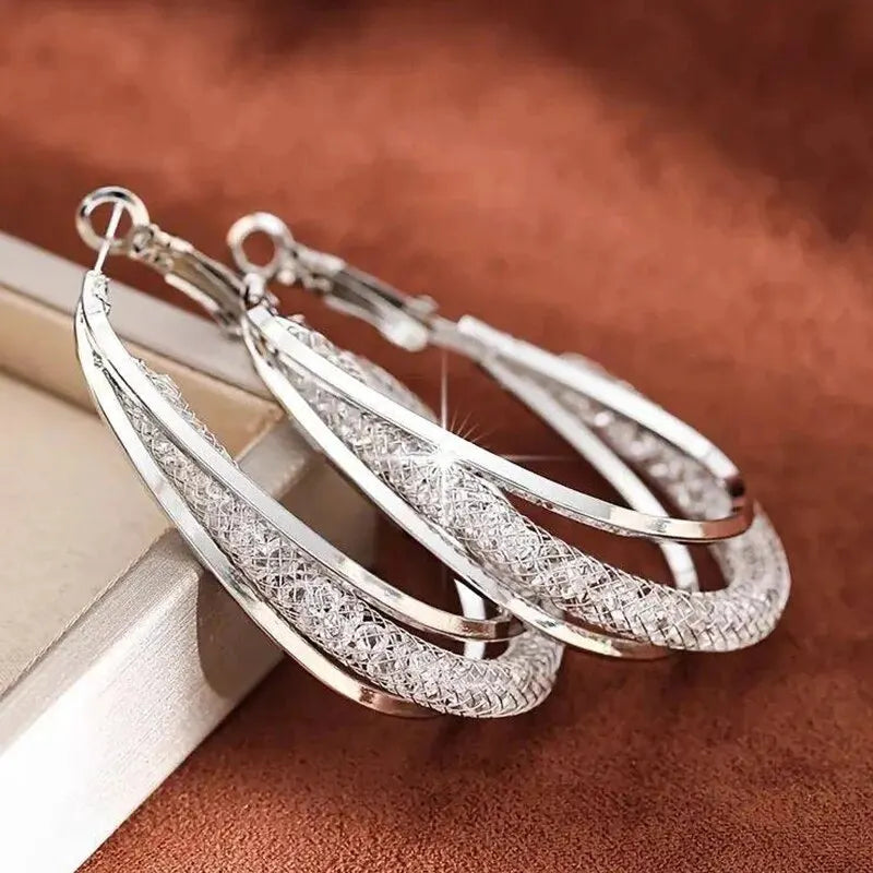 Earrings: Gold & Silver Twisted Hoop Earrings with Crystals